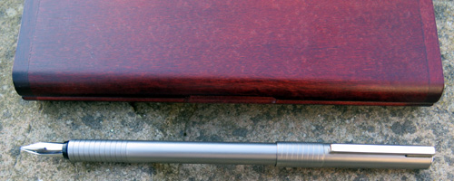 PORSCHE DESIGNS STAINLESS STEEL FOUNTAIN PEN WITH BROAD NIB.